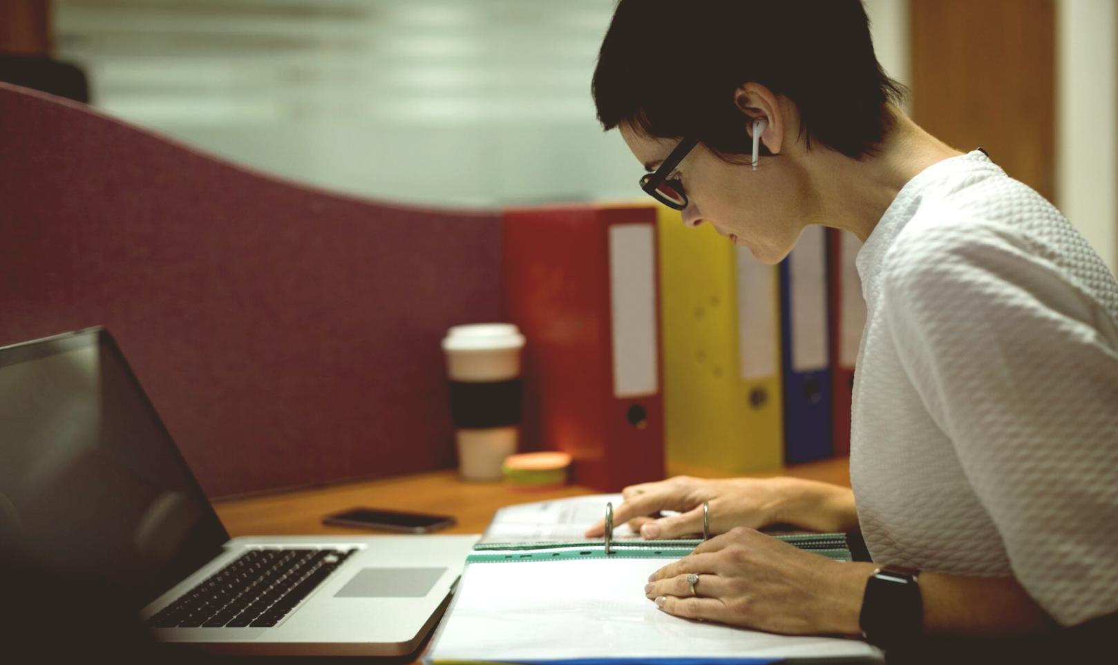 Business owner analyzing financial performance metrics and budget allocations